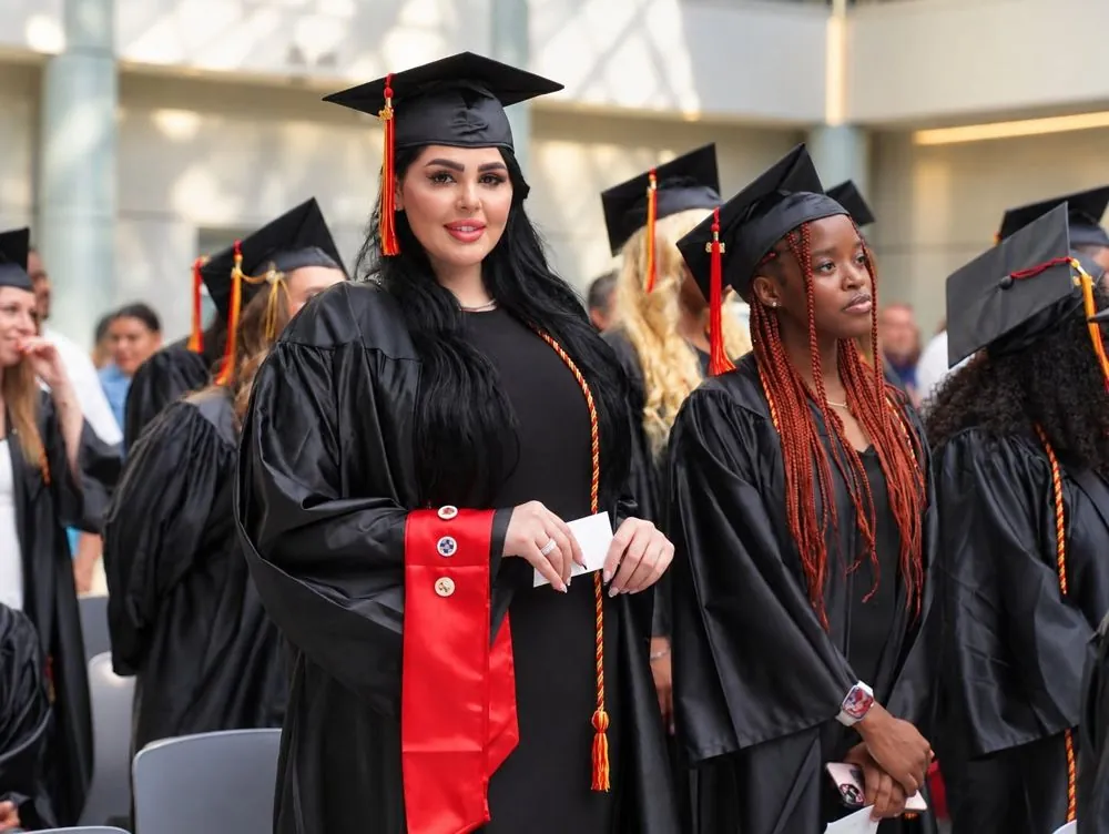 HCI graduates in caps and gowns