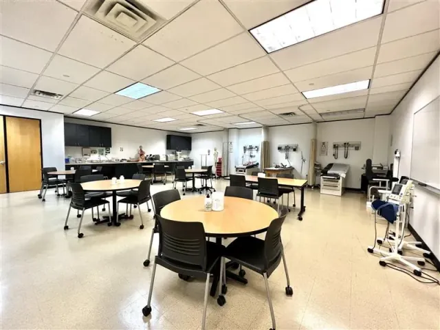 Healthcare Classroom at Houston Career Institute - Collaborative learning spaces with clinical equipment